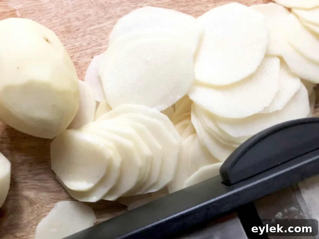 Beef-Filled Scalloped Potato Roulade 10 Thinly sliced potatoes, ready for baking