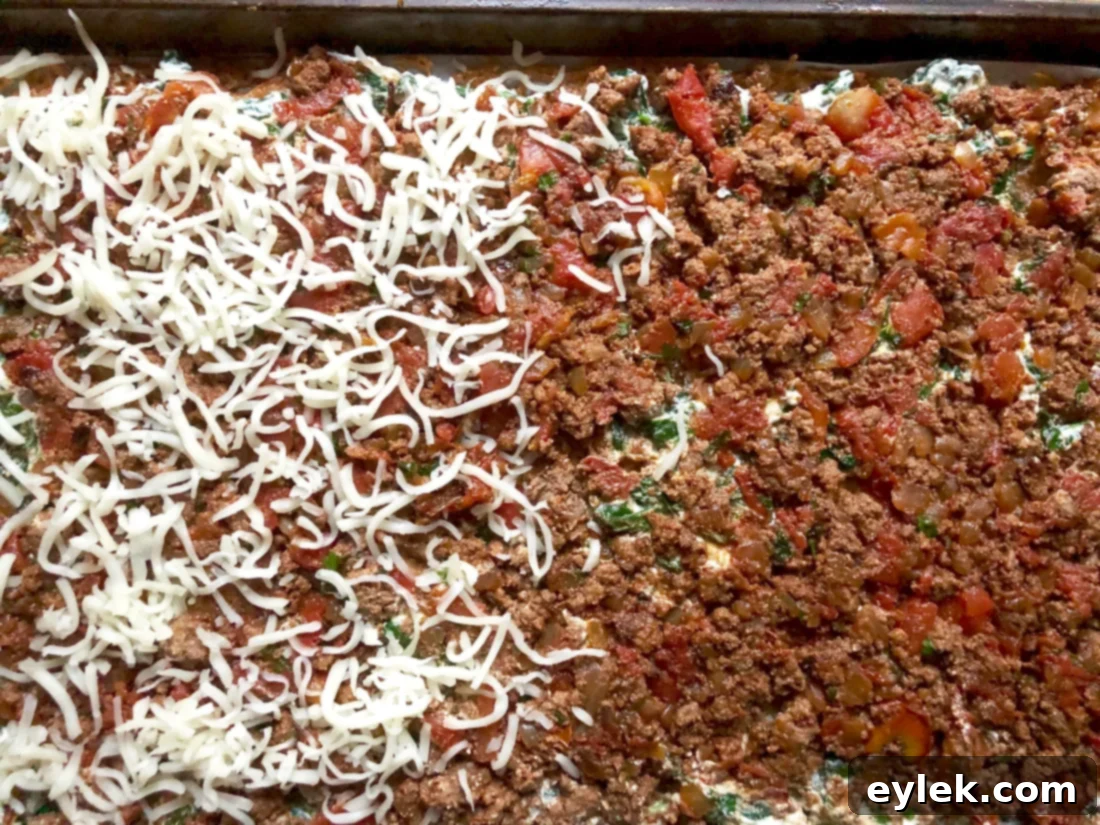 Beef-Filled Scalloped Potato Roulade 16 Mozzarella cheese sprinkled over beef and spinach layers