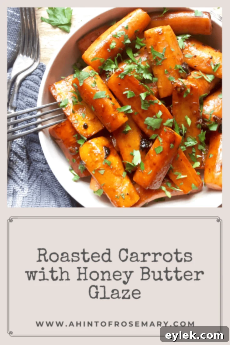 Honey Butter Glazed Roasted Carrots on a plate, garnished with parsley