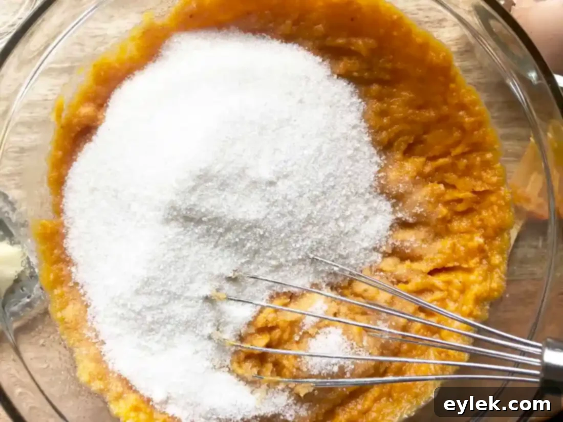 mixing pumpkin bread batter