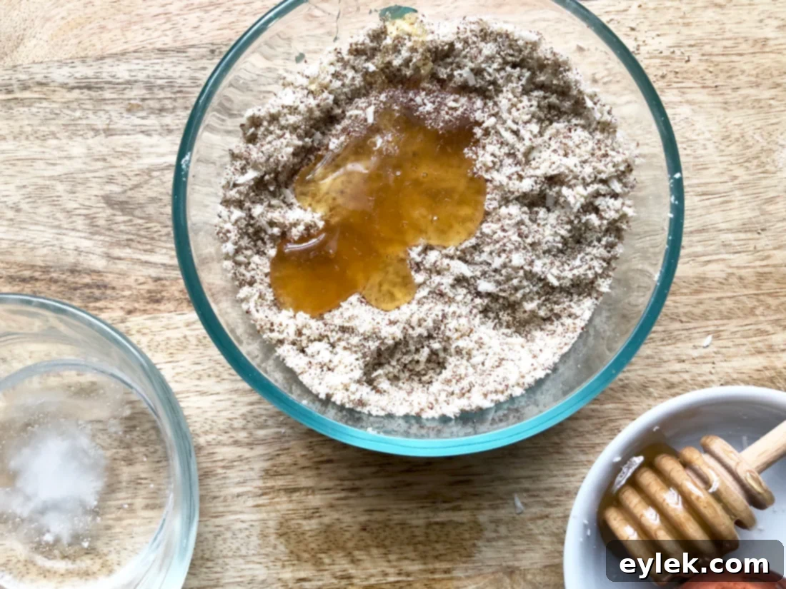 Mixing crumb topping ingredients for healthy muffins