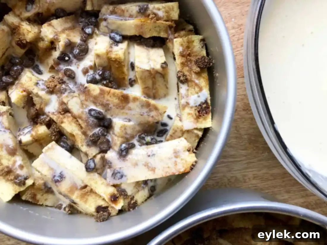 Freshly baked cinnamon raisin bread pudding cooling in the pan