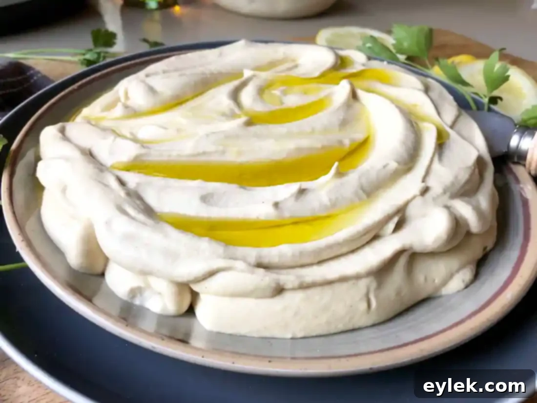 Ottolenghi's hummus drizzled with olive oil, ready to serve
