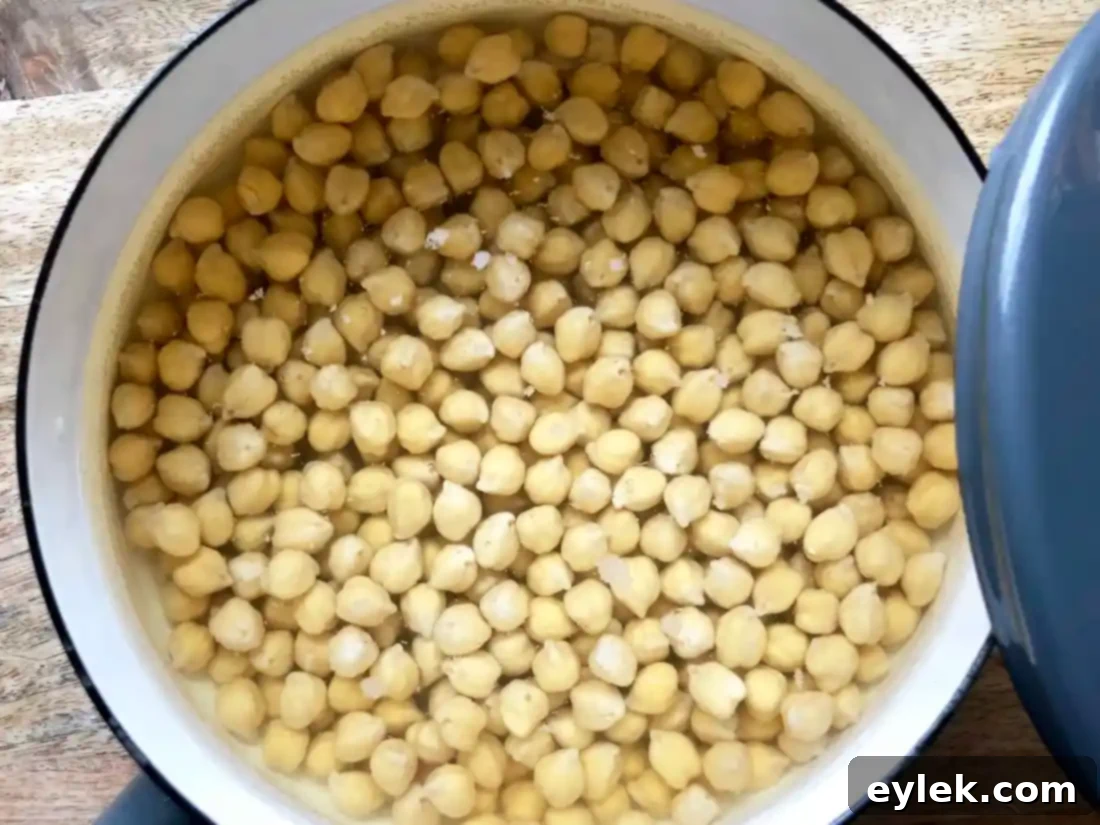 Dried chickpeas soaking in water overnight
