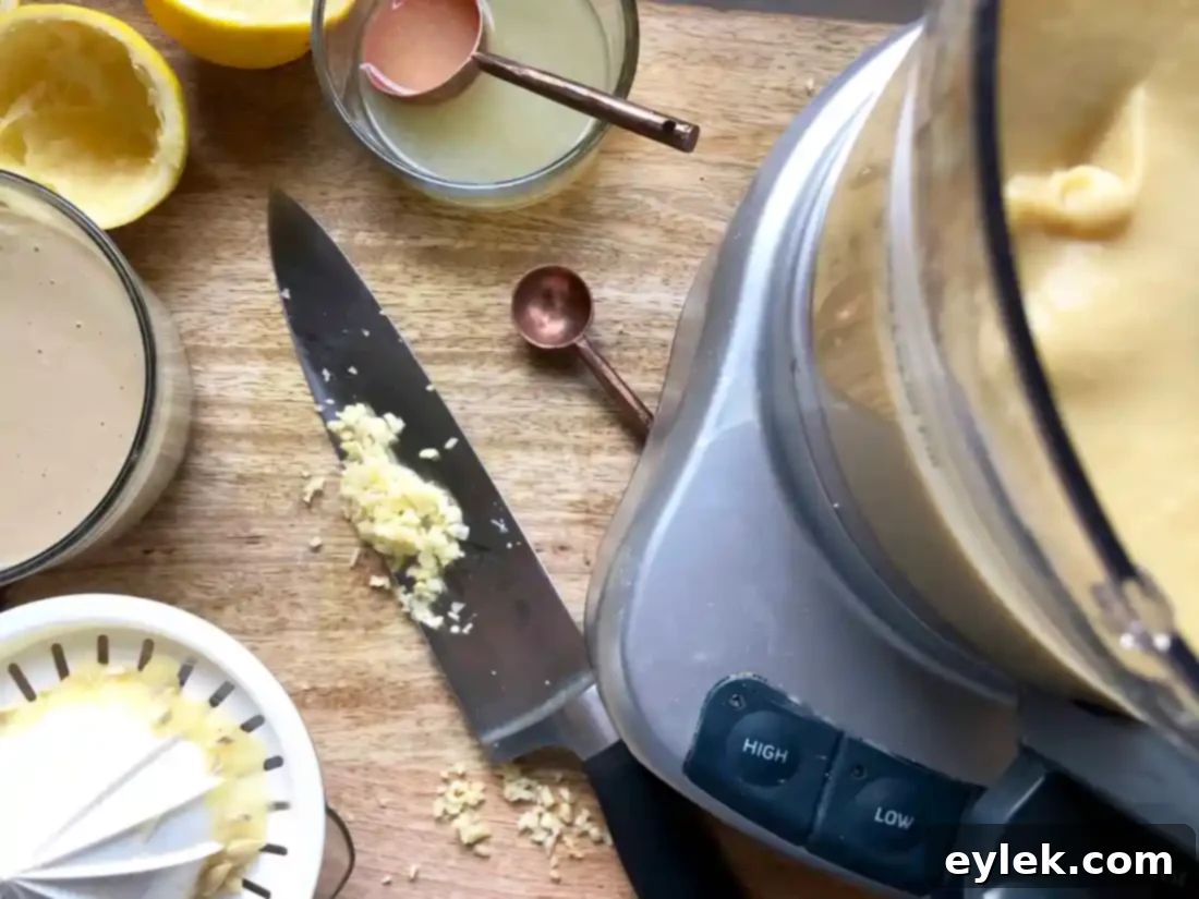 Blended hummus in the food processor, perfectly creamy