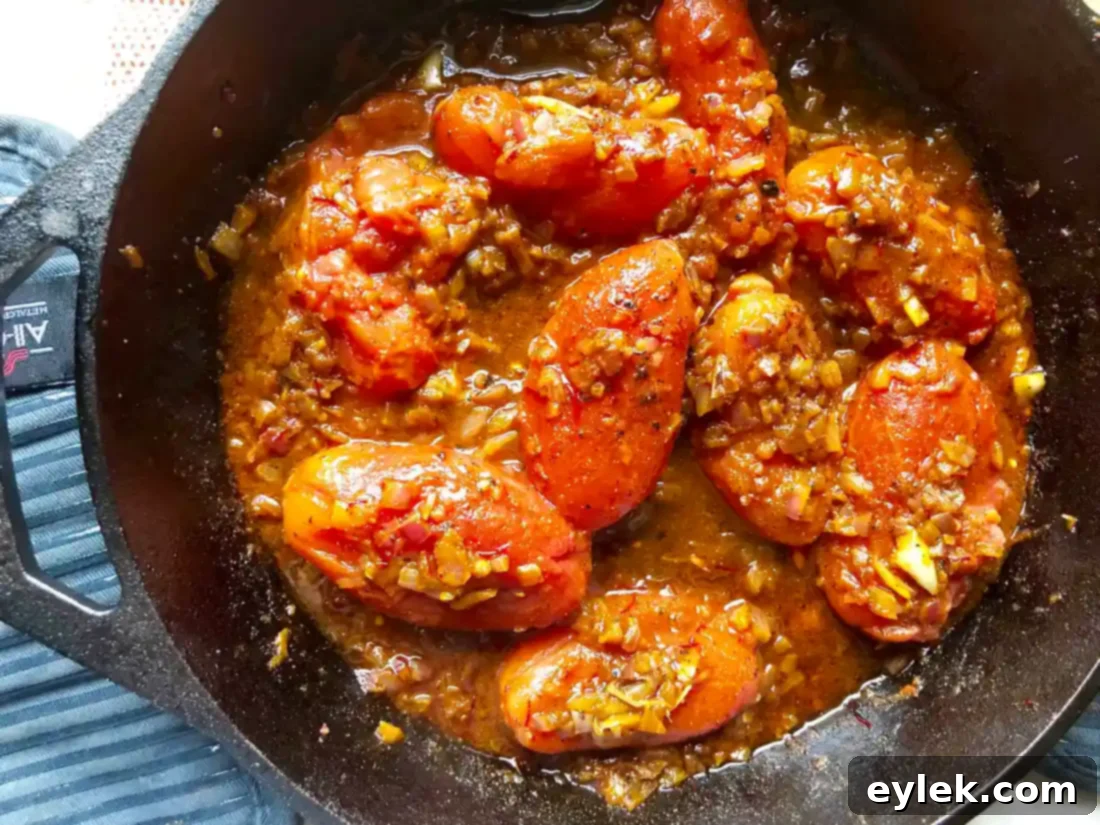Stirring the stewed tomatoes