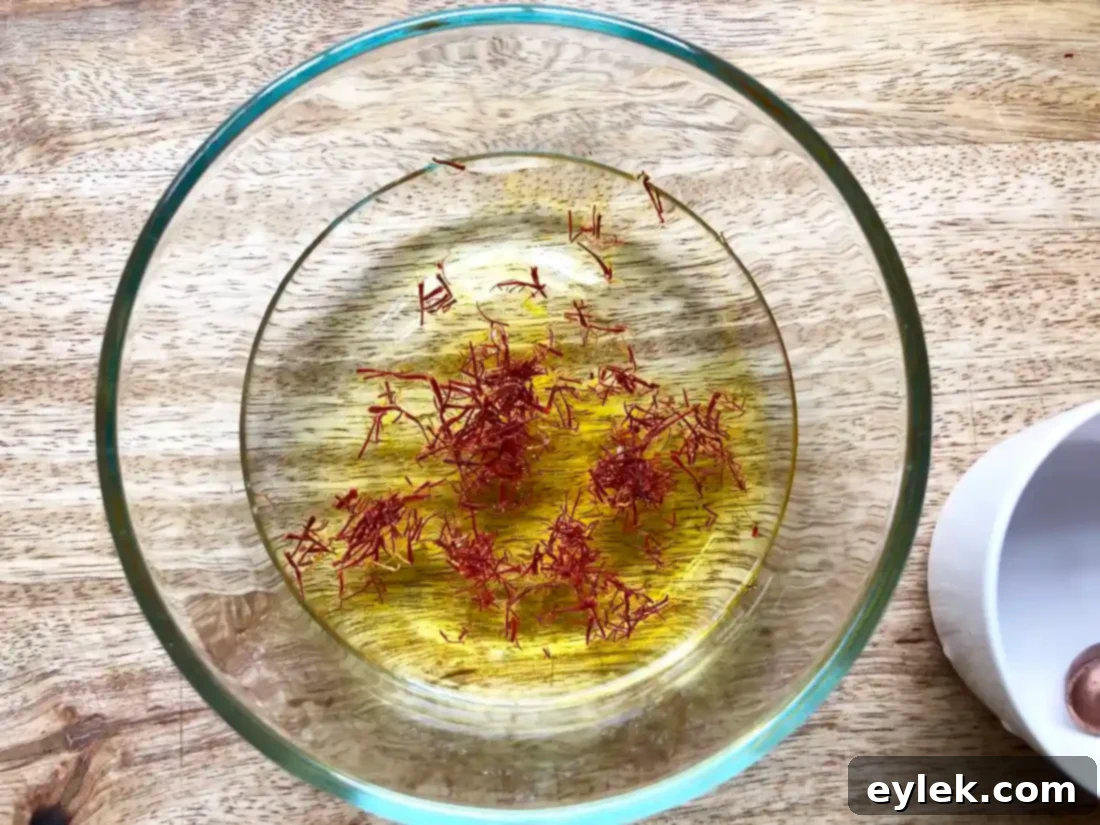 Saffron threads soaking in white wine