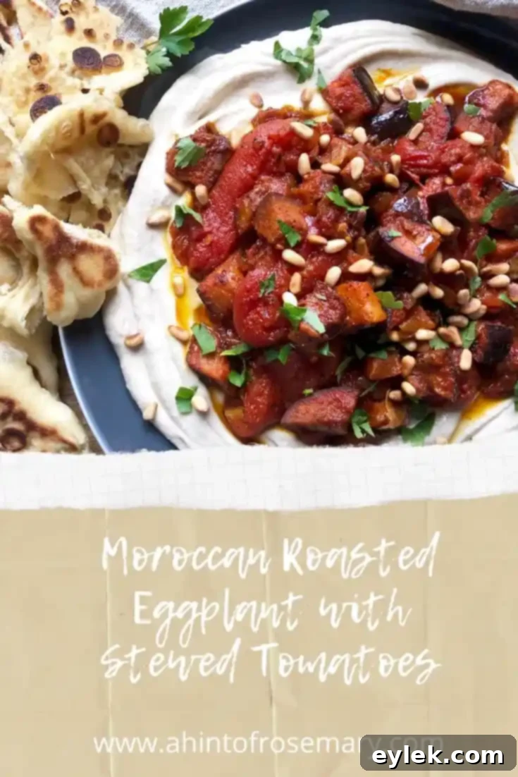 Moroccan Roasted Eggplant with Stewed Tomatoes plated with fresh parsley