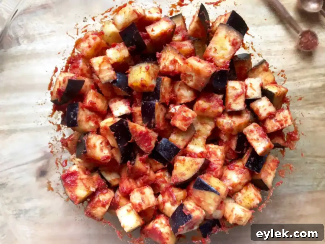 Eggplant cubes with tomato paste coating