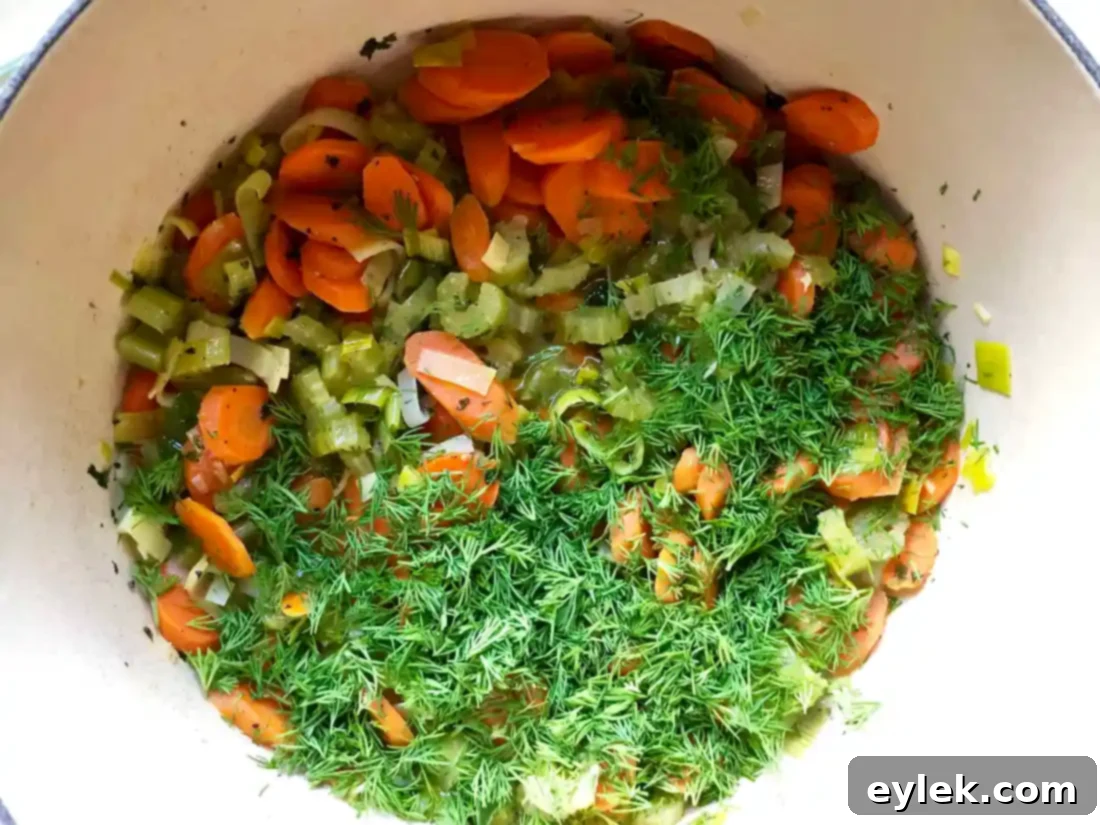 Orzo pasta simmering in the Super Quick Chicken Orzo Soup.