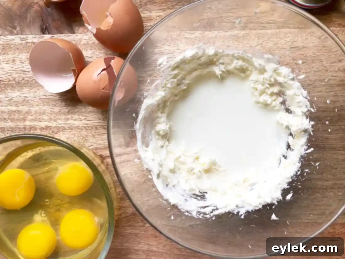 Mixing cream cheese for fluffy eggs