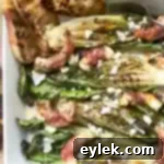 Crispy Prosciutto Shrimp & Grilled Romaine 18 grilled romaine with prosciutto-wrapped shrimp