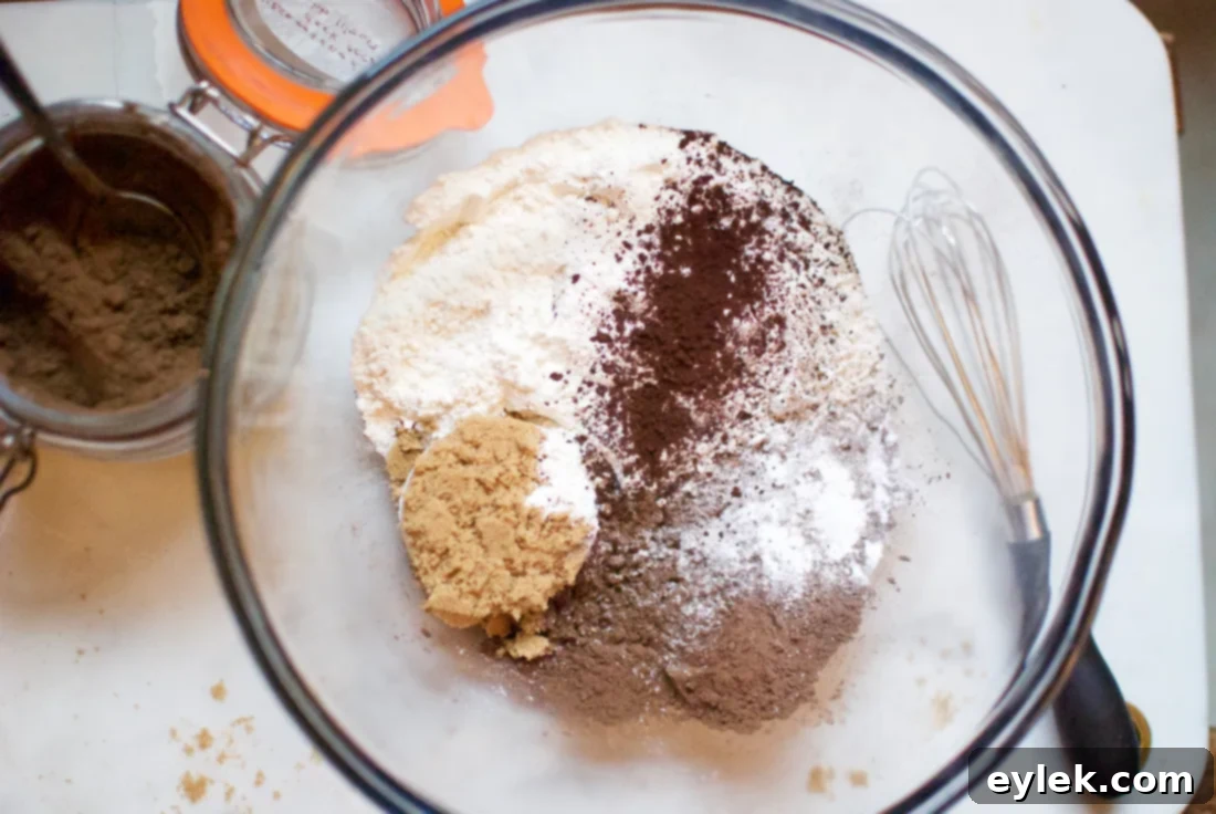Ingredients for dark cocoa banana muffins laid out on a table