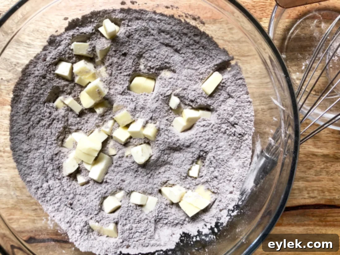 Mixing dry ingredients and cold butter for shortcakes