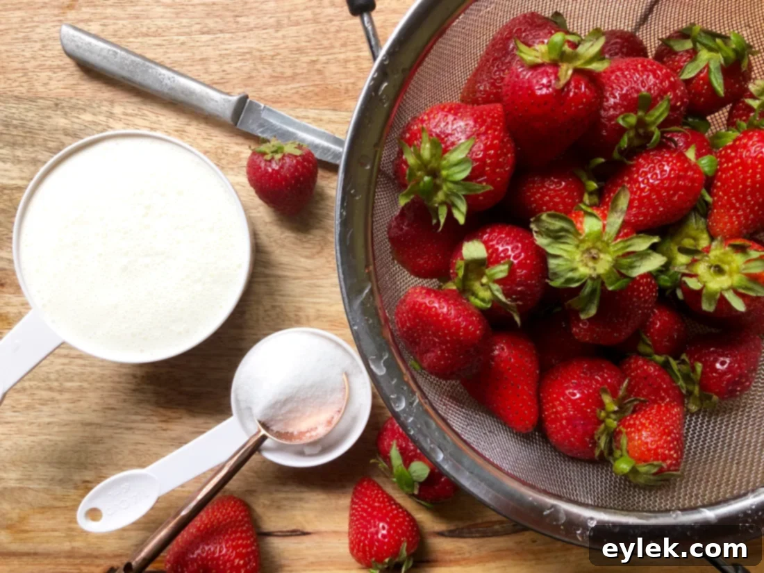 Fresh strawberries being prepared for maceration