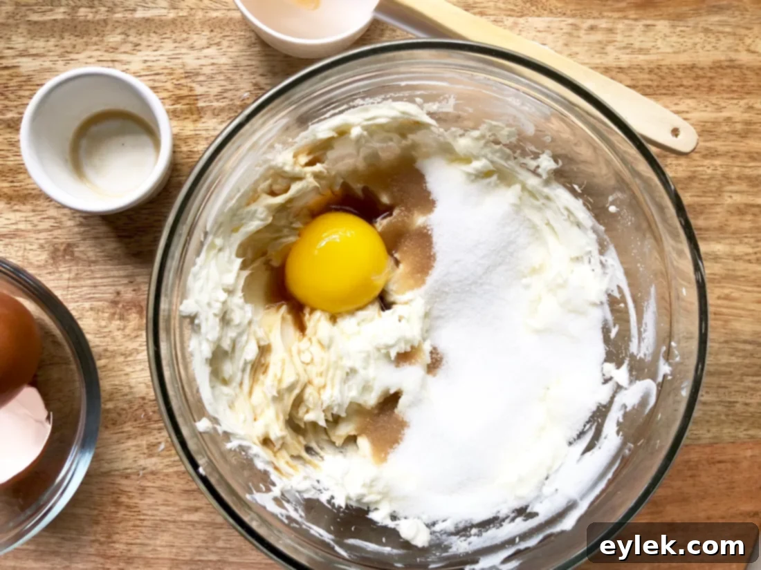 Peeled peach halves ready for baking