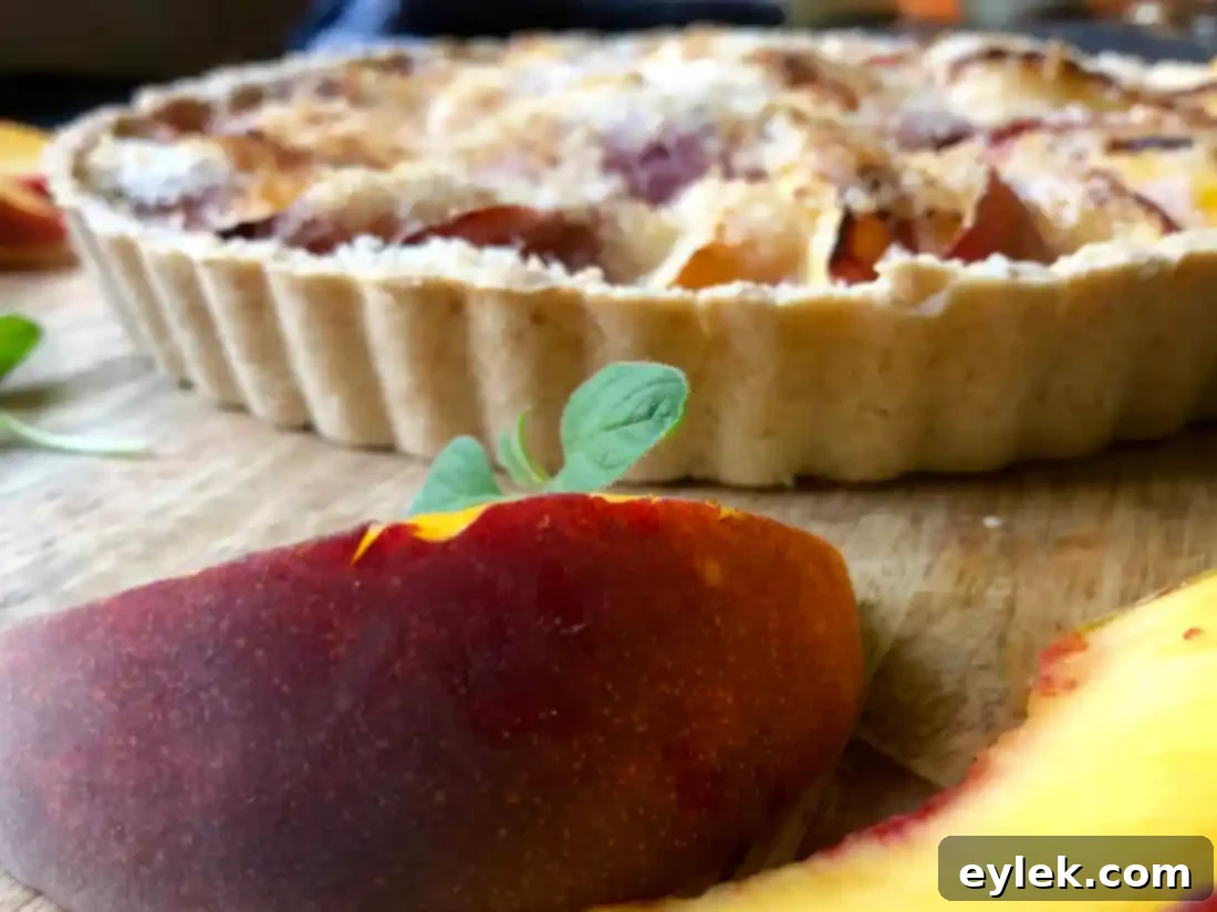 Perfectly sliced peach tart ready to be served