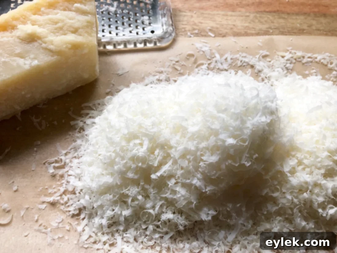 Freshly baked Parmigiano-Reggiano Einkorn Cheese Crackers cooling on a wire rack