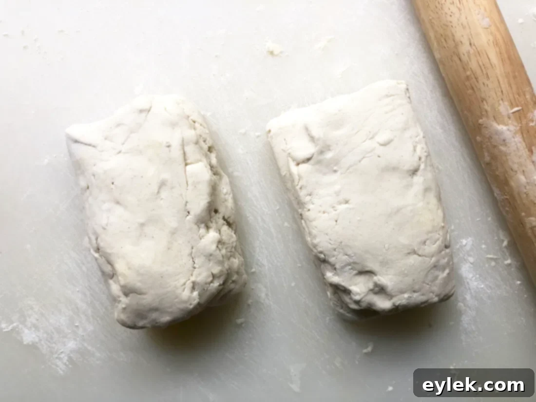 cutting gluten-free pie dough into discs