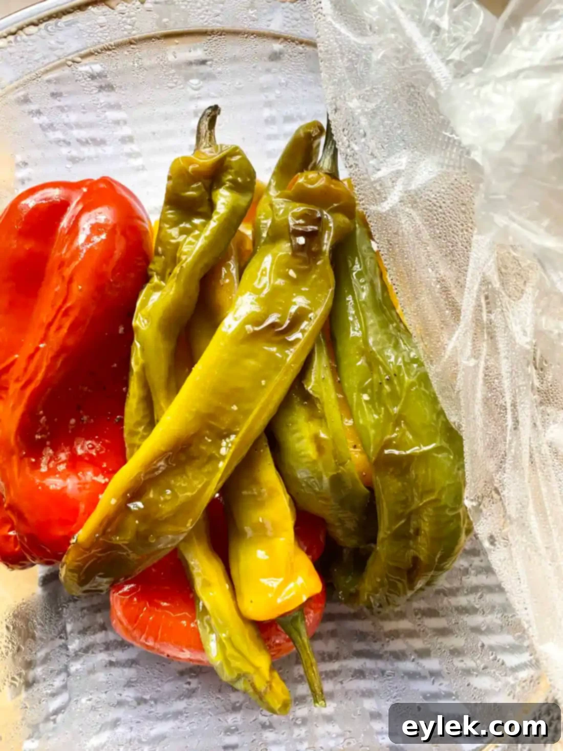 Peeling the skin off a roasted pepper